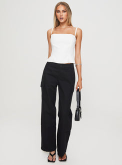 front view of model wearing Princess Polly Raider Low Waist Cargo Pant Black High Rise Pants Pants 