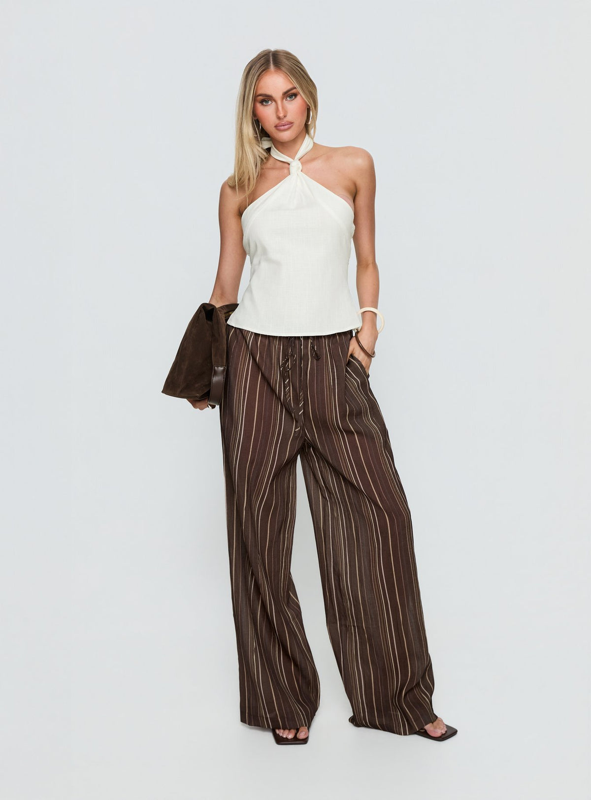 front view of model wearing Princess Polly Parklea Pants Brown Multi High Rise Pants Pants 