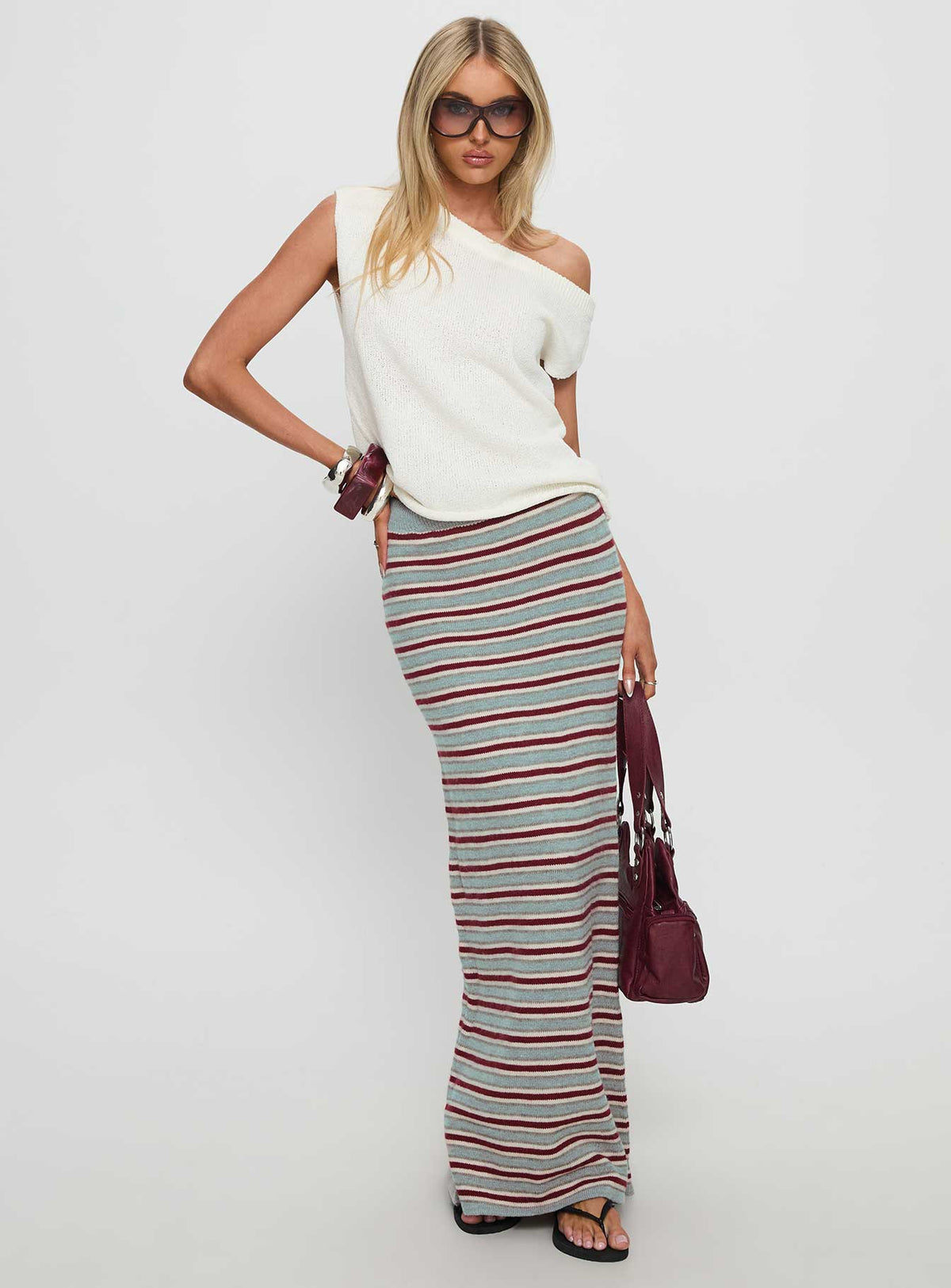   side view of model wearing Princess Polly On Air Knit Maxi Skirt Multi Stripe Skirts 