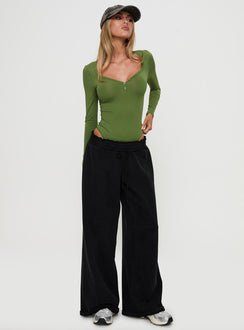 front view of model wearing Princess Polly Delgado Long Sleeve Bodysuit Olive Long Sleeve Tops Bodysuit 