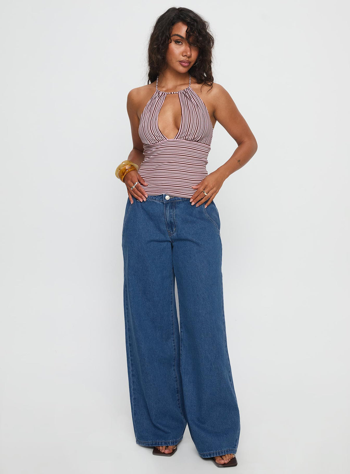 front view of model wearing Princess Polly Polaris Mid Rise Straight Leg Jeans Mid Blue Mid Rise Jeans Jeans 