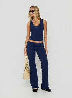Displaying the Daily Define Foldover Waist Pants Navy womens-regular-pants in high-rise wide-leg cut detail view of model wearing Princess Polly
