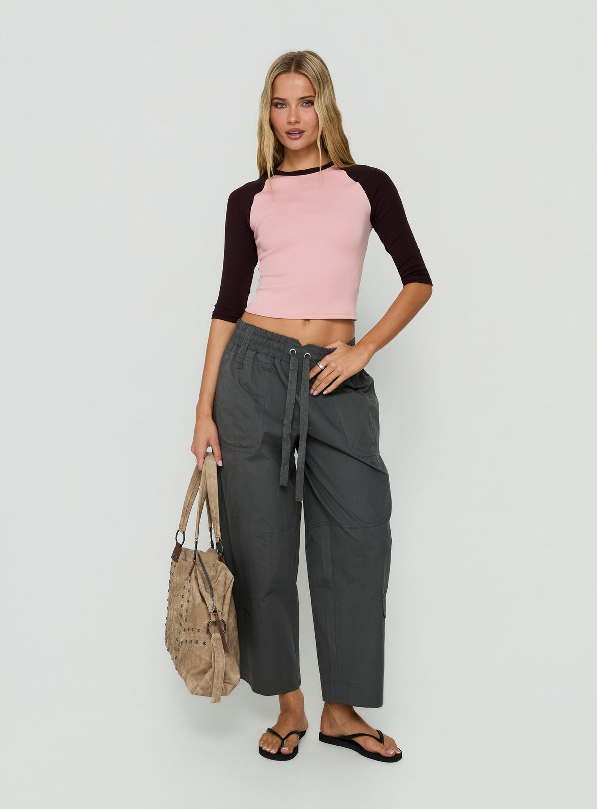 Featuring Fever Cargo Pant Charcoal womens-regular-pants with high-rise front view of model wearing Princess Polly