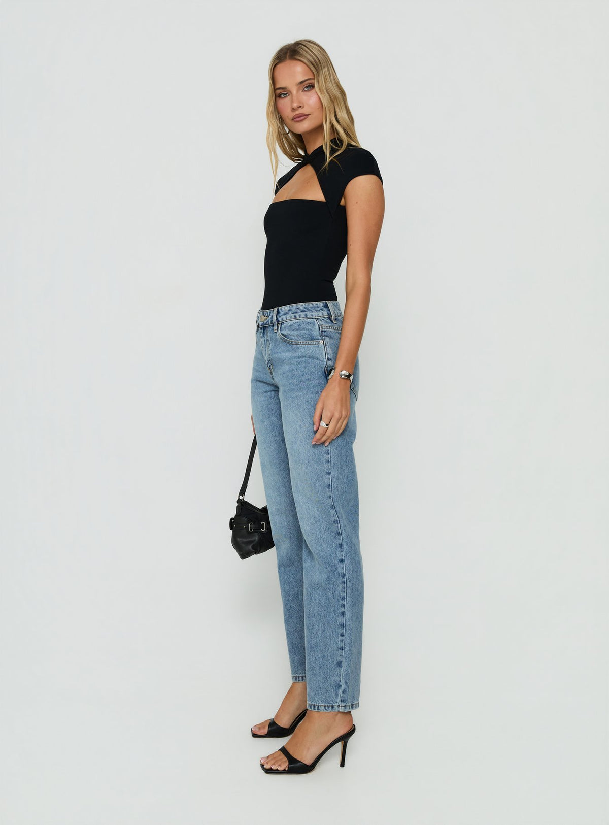 Crafted with Fedela Mid Rise Straight Jeans Light Vintage Blue in womens-jeans and mid-rise waist side view of model wearing Princess Polly