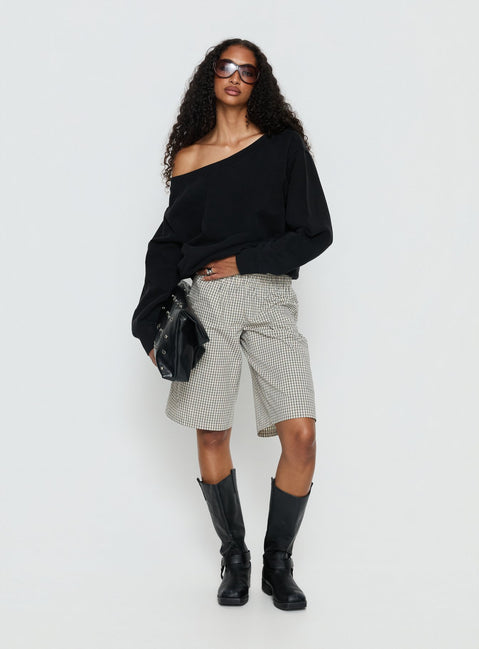 side view of model wearing Princess Polly Wellness Off the Shoulder Jumper Washed Black Longline Jumpers Jumpers 