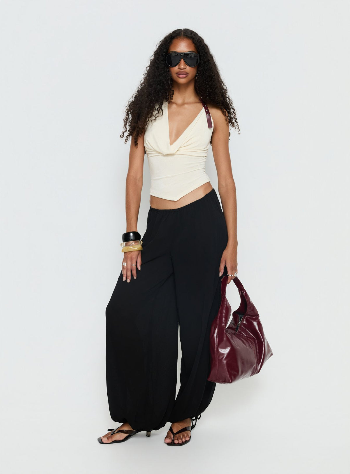 back view of model wearing Princess Polly Moondancer Balloon Pants Black Mid Rise Pants Pants 