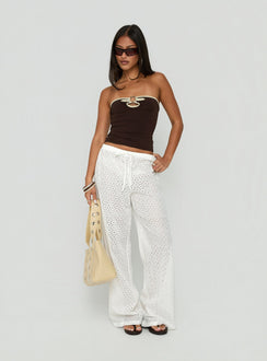 Highlighting the Lindora Drawstring Wide Leg Pants White Broderie in womens-regular-pants with mid-rise waist detail Princess Polly