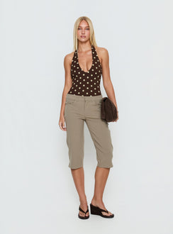 back view of model wearing Princess Polly Someone New Halter Bodysuit Chocolate Polka Sleeveless Bodysuit 