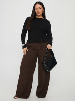 front view of model wearing Princess Polly Khane Low Rise Wide Leg Pant Brown Pinstripe Curve Low Rise Pants Pants 