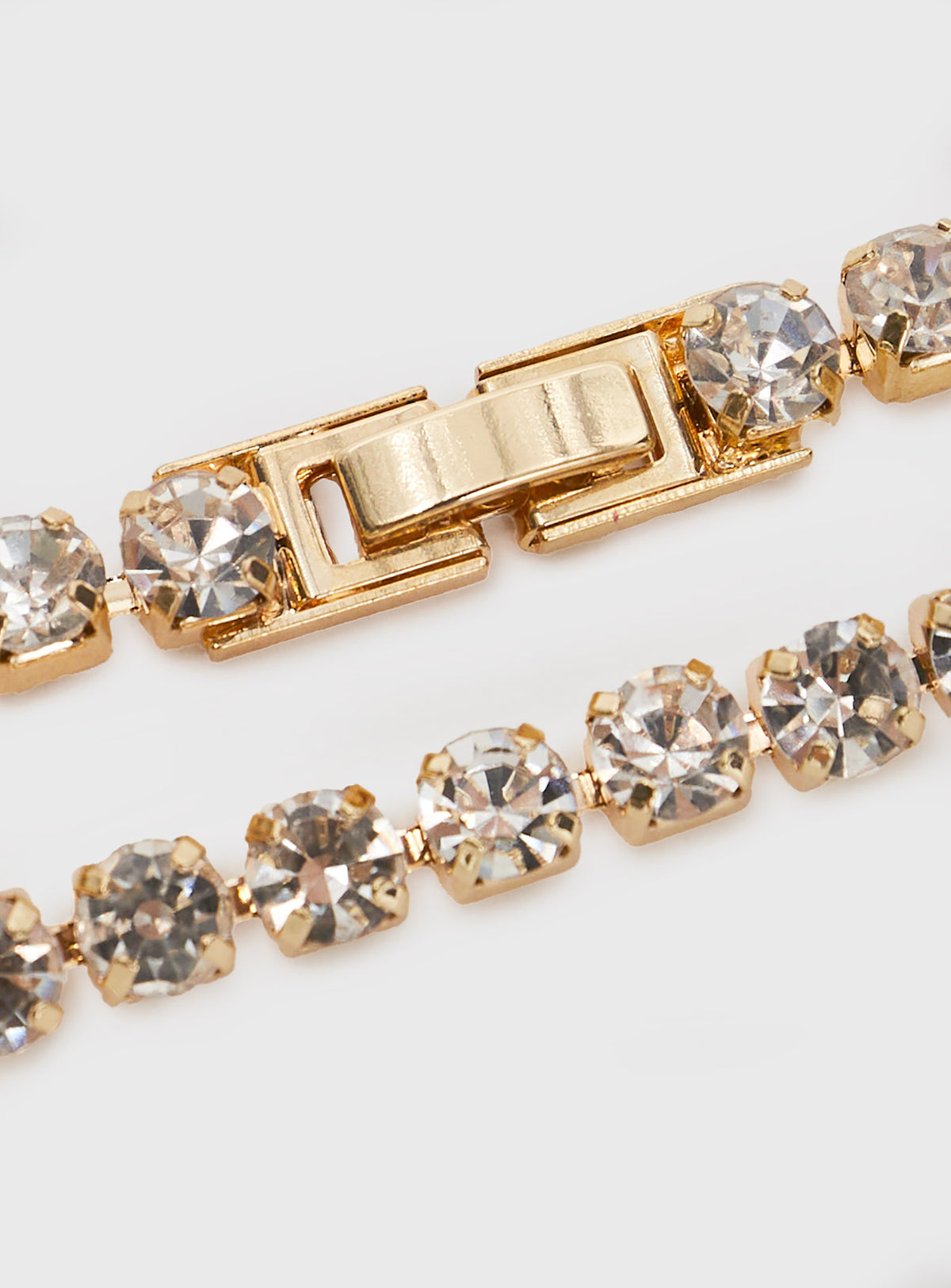 Gold-toned bracelet Diamante detail, clasp fastening, fixed length