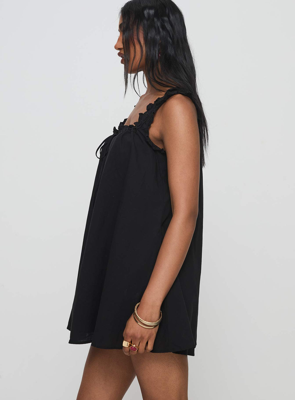 side view of model wearing Princess Polly Swing Mini Dress Black Square Neck 