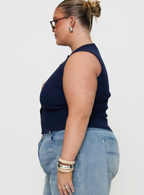 side view of model wearing Princess Polly Suzu Sleeveless Top Navy Curve Sleeveless Crew Neck 
