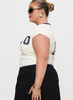 side view of model wearing Princess Polly Track Record Graphic Top Cream Curve Short Sleeves Crew Neck 