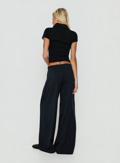 Styled Yuzima Micro Belt Pleated Pants Navy Pinstripe in womens regular pants with mid-rise back view of model wearing Princess Polly