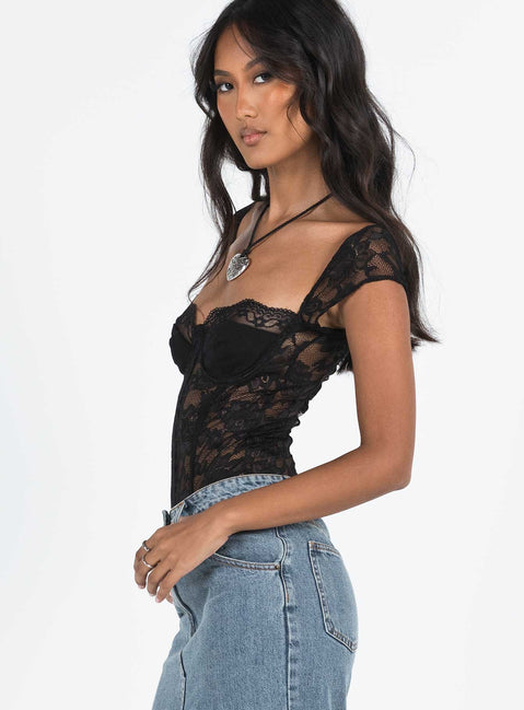 side view of model wearing Princess Polly Cadrot Lace Bodysuit Black Short Sleeve Bodysuit 