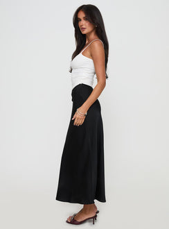   side view of model wearing Princess Polly Haley Maxi Skirt Black Maxi Skirts Skirts 