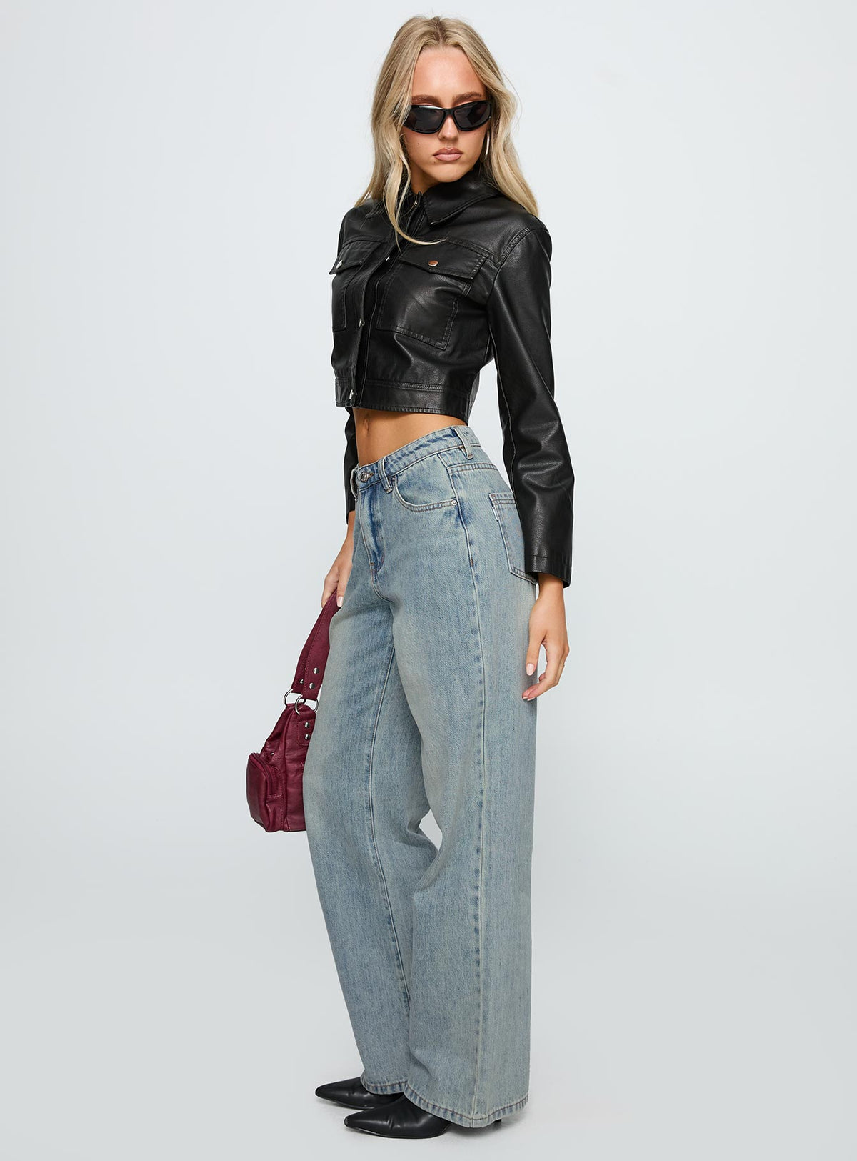 side view of model wearing Princess Polly Echo Park High Rise Straight Leg Jeans Vintage Wash Mid Rise Jeans Jeans 