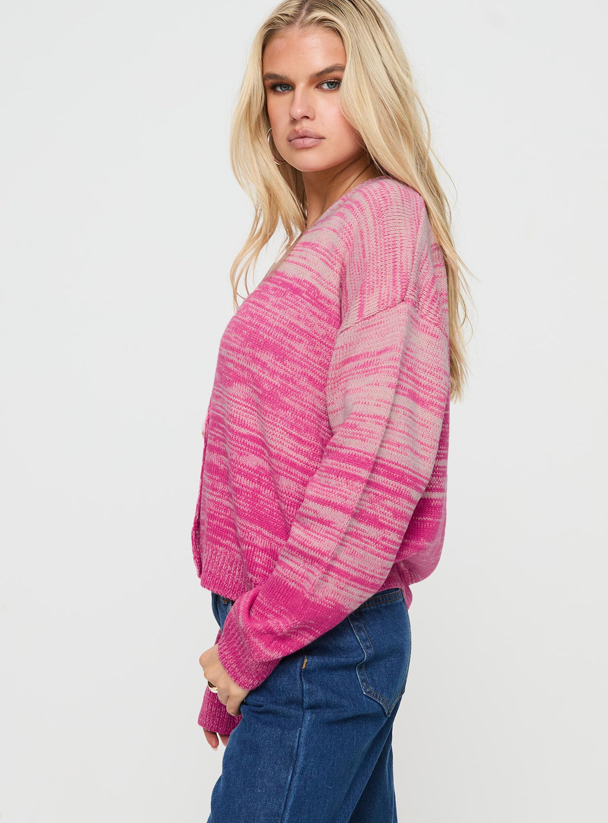 side view of model wearing Princess Polly Emikio Cardigan Ombre Pink regular Jumpers 