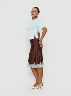 Showcasing timeless appeal, Miriza Lace Trim Midi Skirt Chocolate / Blue womens-skirts in fitted a-line silhouette side view of model wearing Princess Polly