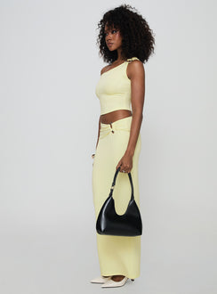   side view of model wearing Princess Polly Whiley Maxi Skirt Cream Maxi Skirts Skirts 