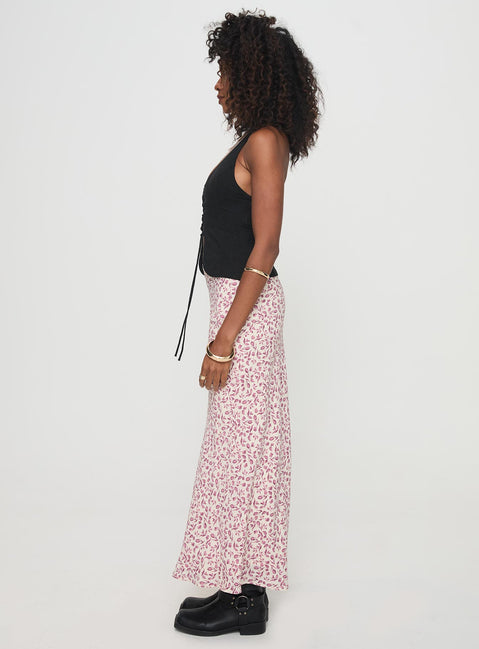   side view of model wearing Princess Polly Mariposa Maxi Skirt Beige Floral Maxi Skirts Skirts 