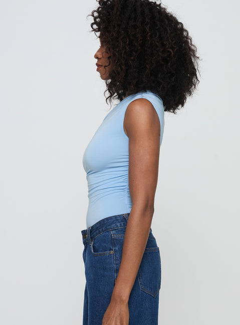 side view of model wearing Princess Polly Beller Bodysuit Blue Short Sleeve Bodysuit 