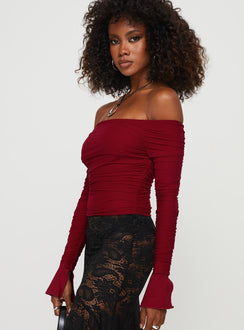 side view of model wearing Princess Polly Moreno Off The Shoulder Top Burgundy Full Sleeves straight 