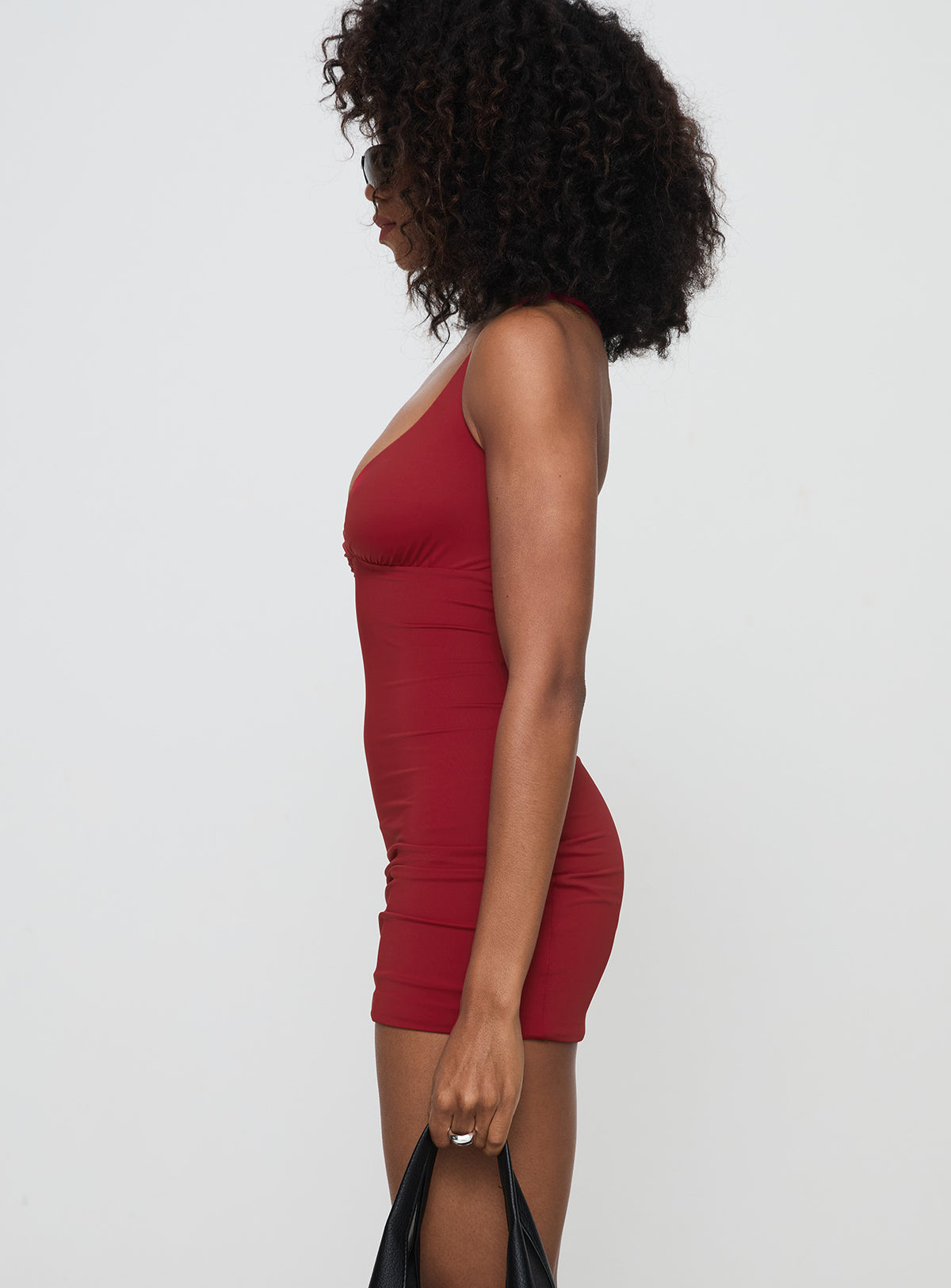 side view of model wearing Princess Polly Wandella Mini Dress Red Plunger 