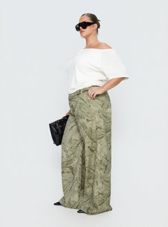 side view of model wearing Princess Polly Mckinley Mid Rise Wide Leg Jeans Camouflage Curve Mid Rise Jeans Jeans 