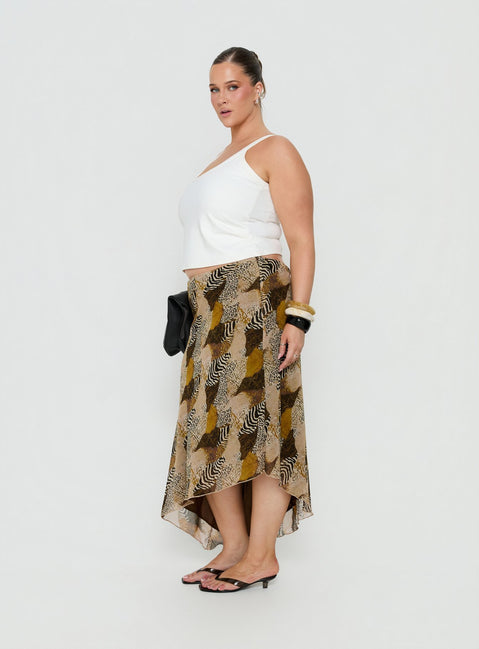 Featuring the Suella Asymmetrical Midi Skirt Animal Multi Curve in womens-skirts with fitted silhouette and frayed hem in animal-leopard print side view of model wearing Princess Polly