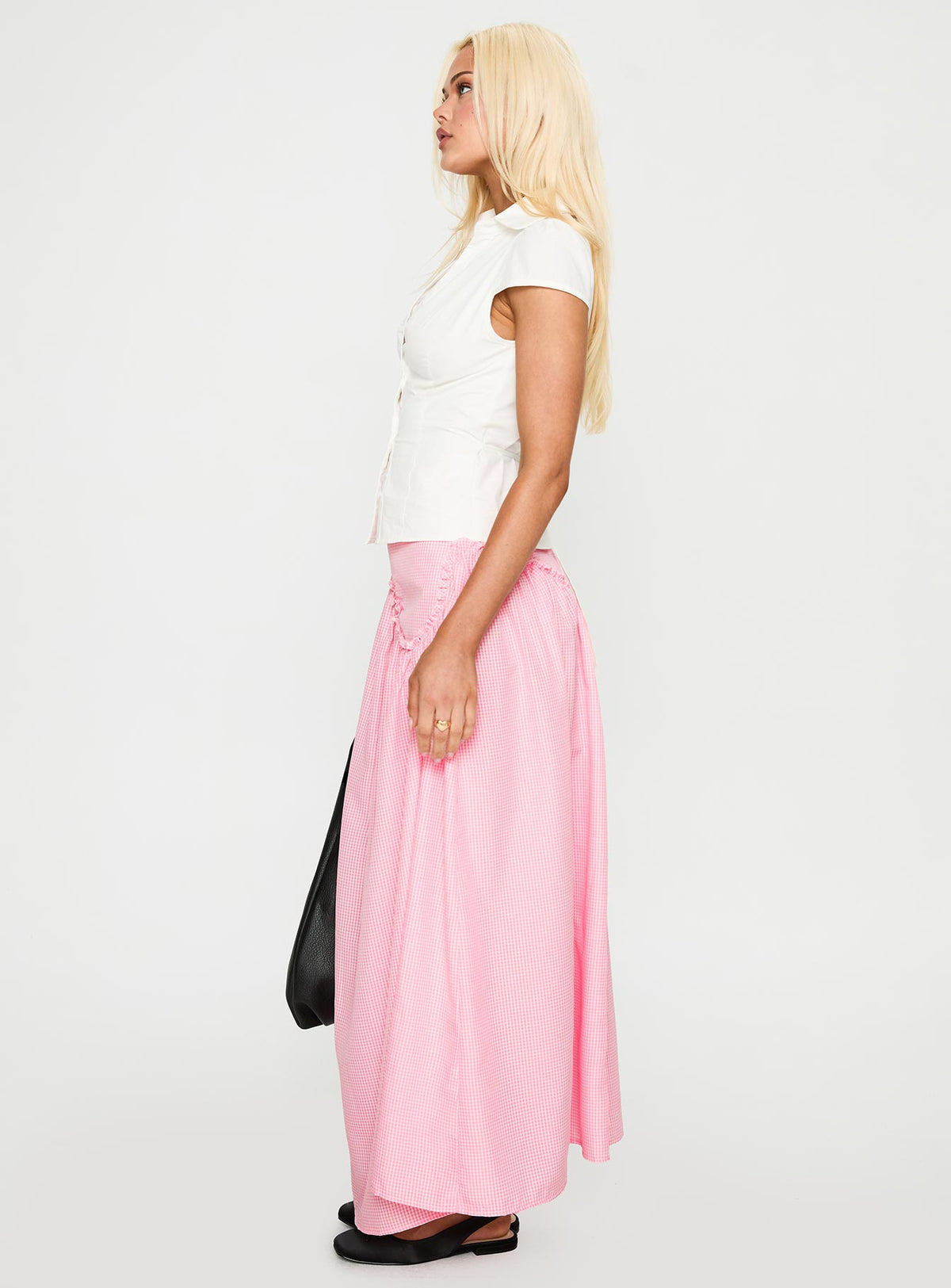   side view of model wearing Princess Polly Apresia Maxi Skirt Pink Gingham Maxi Skirts Skirts 