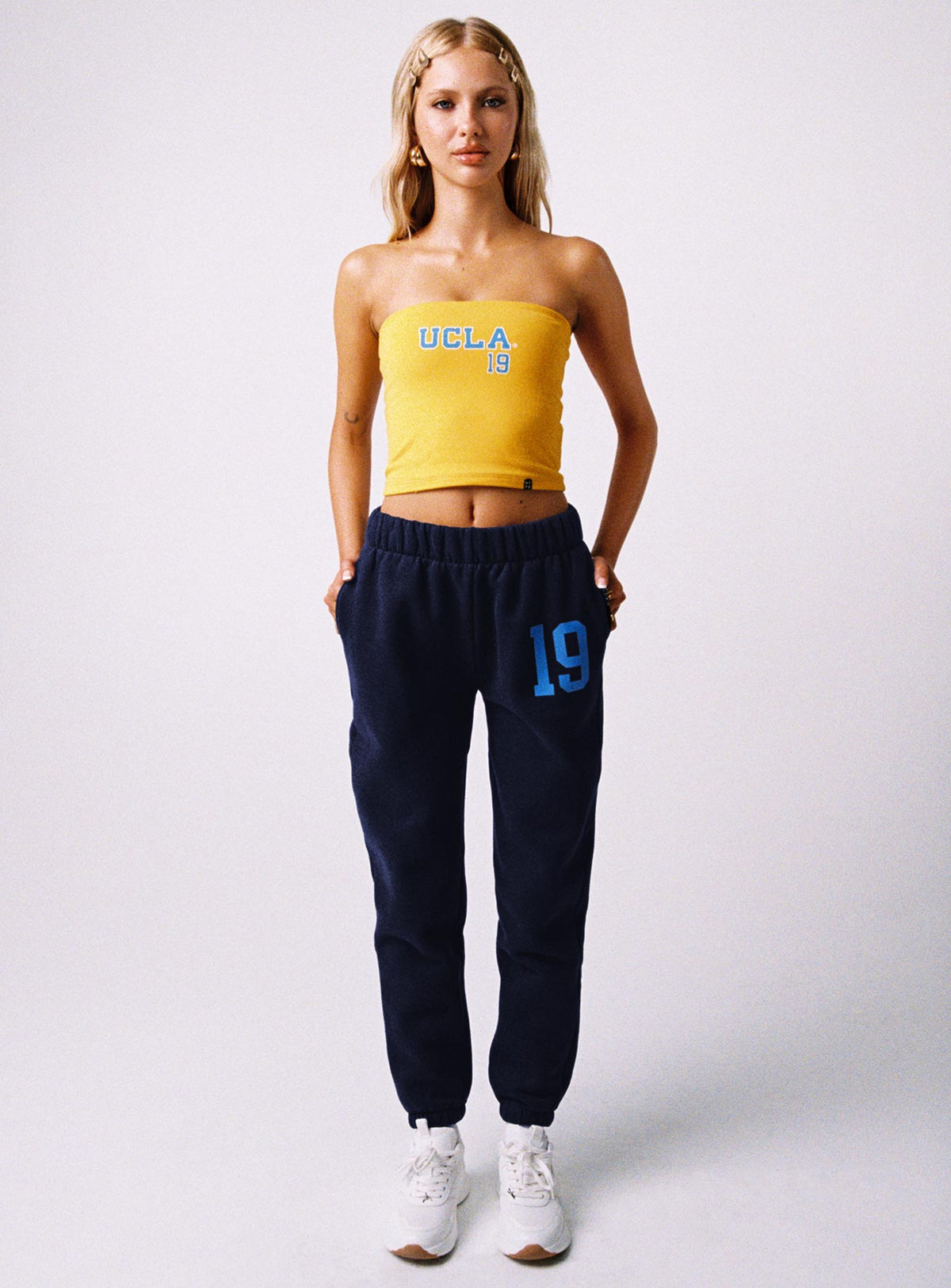 front view of model wearing Princess Polly UCLA Sweatpants Navy High Rise Pants Pants 