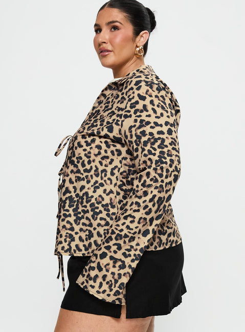 side view of model wearing Princess Polly Toriah Long Sleeve Tie Up Top Leopard Curve Full Sleeves V-Neck 