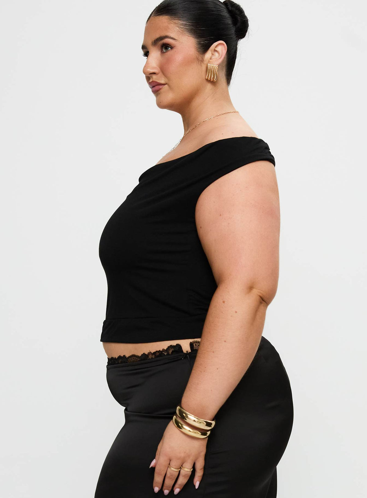side view of model wearing Princess Polly Irina Multi-wear Top Black Curve Short Sleeves straight 