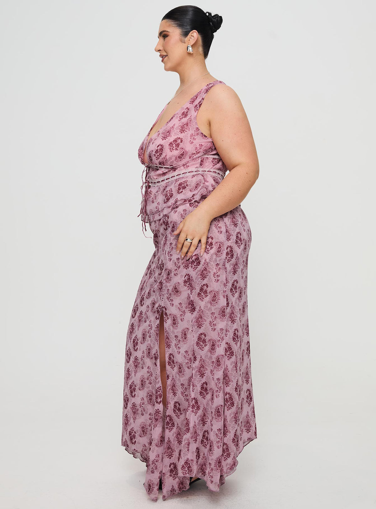  side view of model wearing Princess Polly Nikolise Maxi Skirt Purple Curve Maxi Skirts Skirts 