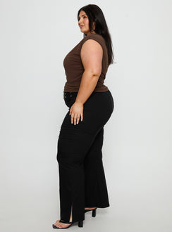 side view of model wearing Princess Polly Kortnee Eyelet Detail Flare Leg Pants Black Curve Mid Rise Pants Pants 