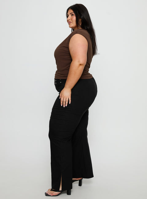 side view of model wearing Princess Polly Kortnee Eyelet Detail Flare Leg Pants Black Curve Mid Rise Pants Pants 