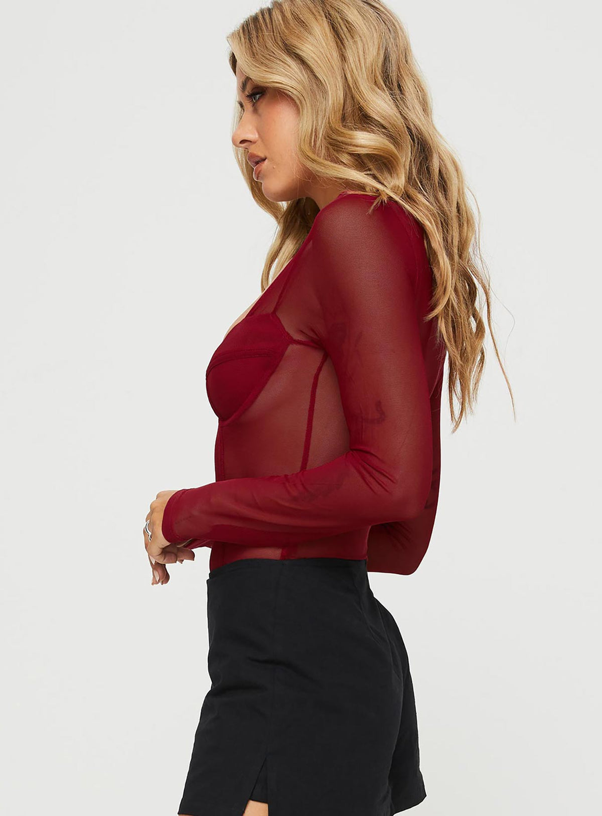 side view of model wearing Princess Polly Leonie Bodysuit Burgundy Long Sleeve Tops Bodysuit 