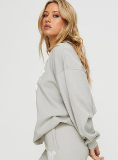 side view of model wearing Princess Polly Princess Polly Crew Neck Sweatshirt Bubble Text Grey / Cloud White Longline Jumpers Jumpers 