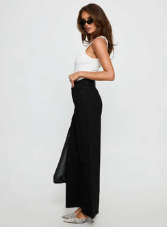 side view of model wearing Princess Polly Henesey High Rise Straight Leg Jeans Jet Black High Rise Jeans Jeans 