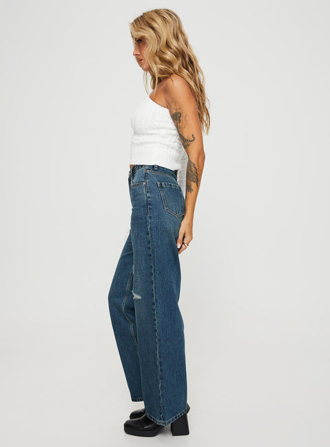 side view of model wearing Princess Polly Beetle High Rise Wide Leg Ripped Jeans Mid Wash Mid Rise Jeans Jeans 