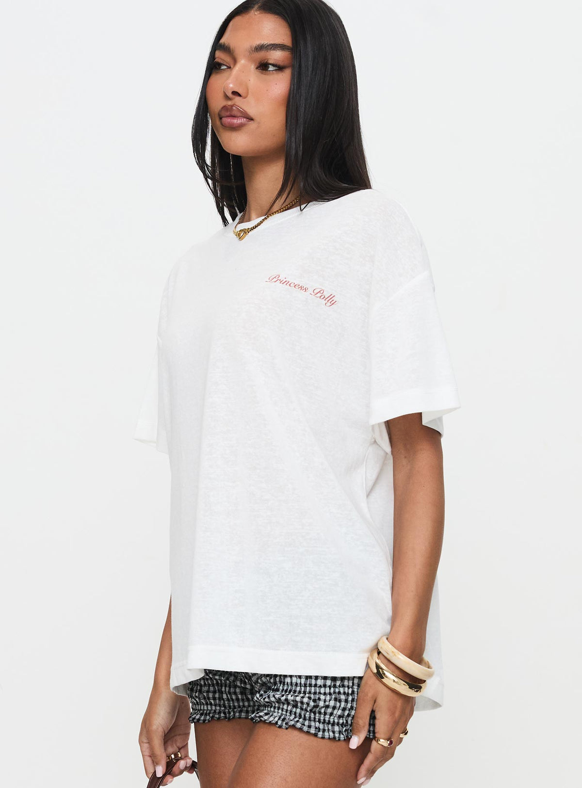 side view of model wearing Princess Polly Bakery Caked Oversized Tee Cream Half Sleeves Crew Neck 