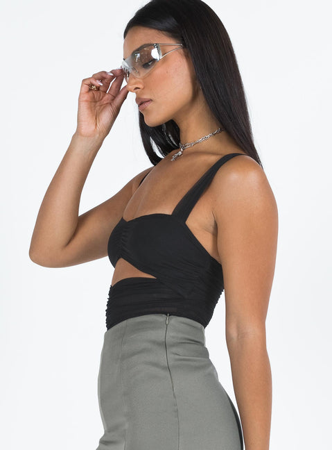 side view of model wearing Princess Polly Kalmia Bodysuit Black Sleeveless Bodysuit 