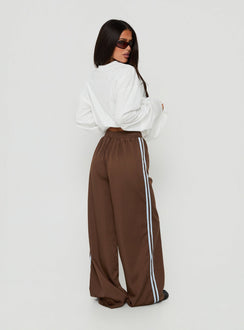 Presenting the Fielder Track Pants Brown / Blue womens-regular-pants featuring high-rise back view of model wearing Princess Polly