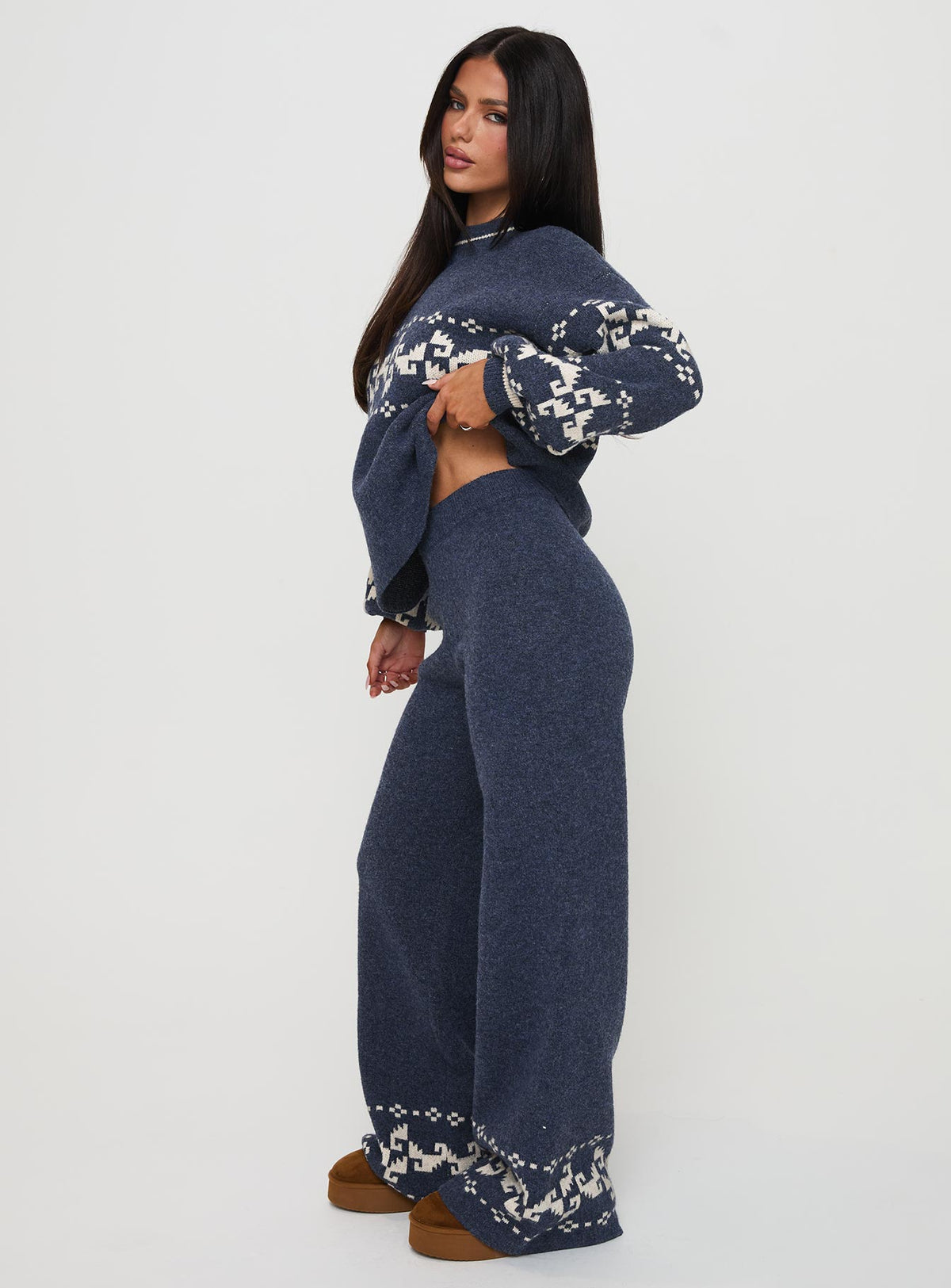 side view of model wearing Princess Polly Alpine Knit Pants Navy / Cream High Rise Pants Pants 