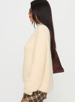side view of model wearing Princess Polly Abott Sweater Butter Longline Jumpers Jumpers 