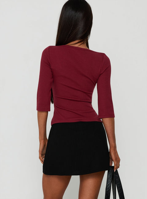 Designed with the Selley Low Rise Mini Skirt Black womens-skirts in mini length back view of model wearing Princess Polly