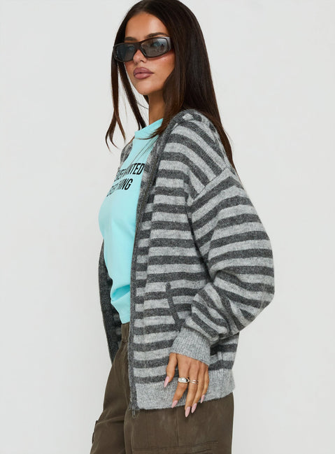 Showcasing the Aubry Oversized True Knit Hoodie in Grey Stripe, a short length womens jumper designed with an oversized fit side view of model wearing Princess Polly