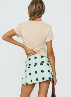 back view of model wearing Princess Polly Elicia Ruched Mini Skirt Mint / Chocolate Polka Dot Mini Skirts Skirts 