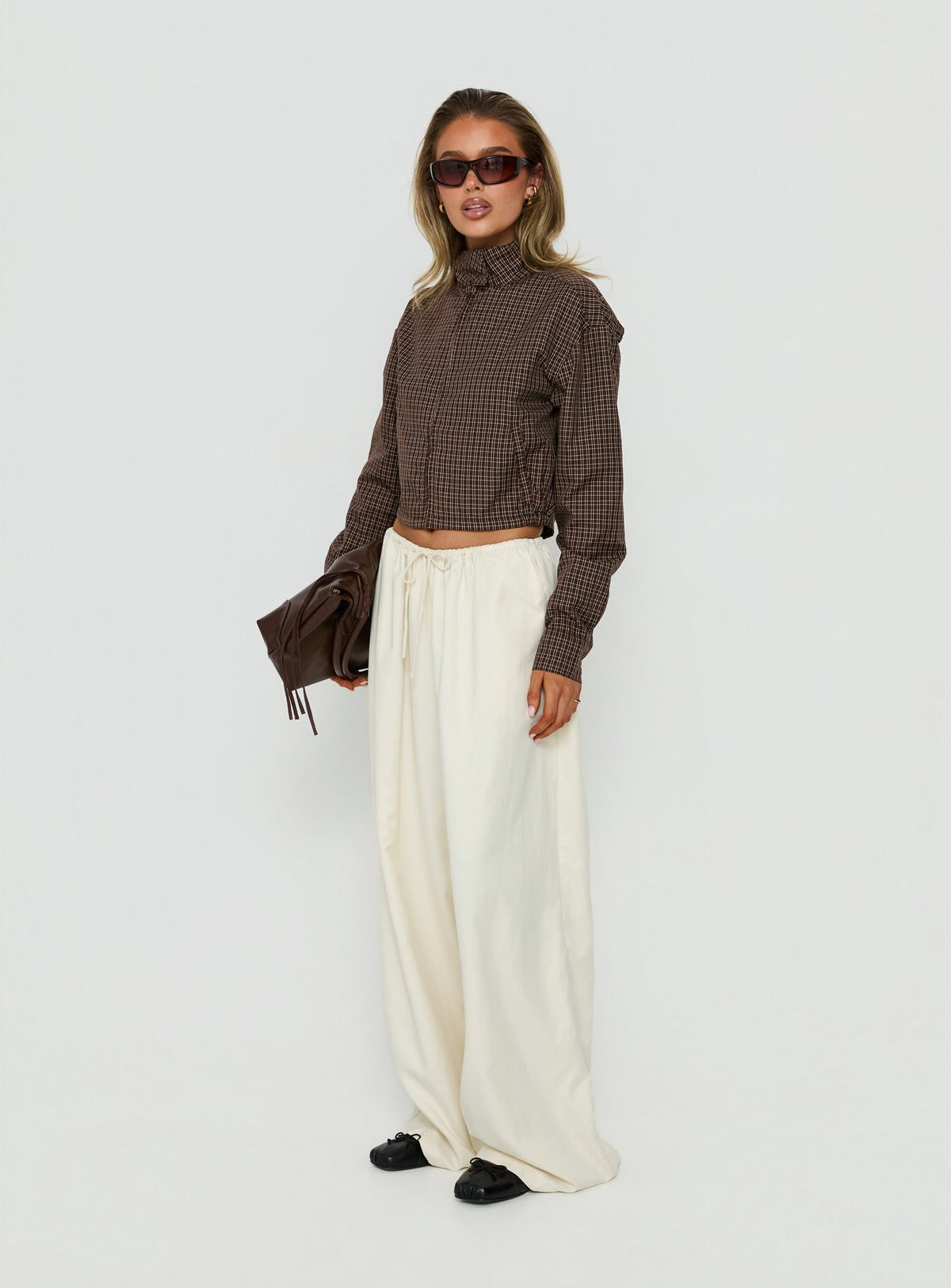 Introducing the Bungala Oversized Relaxed Pants in Ivory Petite womens-regular-pants featuring high-rise waist and wide-leg silhouette front view of model wearing Princess Polly